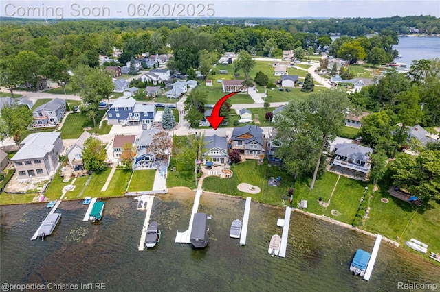 11693 Kenton Dr, Whitmore Lake, MI 48189 - aerial view of property and surrounding area featuring a large body of water and nearby suburban area