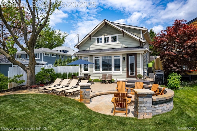 11693 Kenton Dr, Whitmore Lake, MI 48189 - back of house featuring a patio