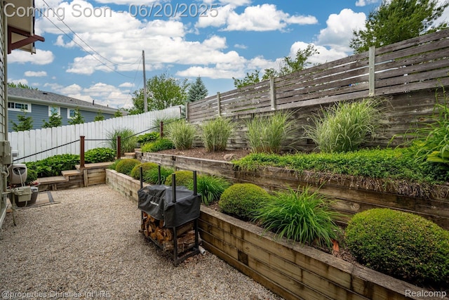 11693 Kenton Dr, Whitmore Lake, MI 48189 - fenced backyard with a grill
