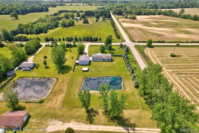 5490 Rupprecht Rd, Vassar, MI 48768 - aerial view of sparsely populated area featuring a nearby body of water and extensive farmland