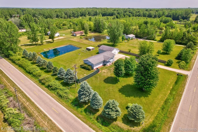5490 Rupprecht Rd, Vassar, MI 48768 - aerial view of a heavily wooded area and a large body of water