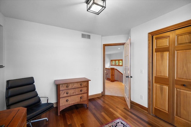 4679 Forest Ridge Dr, Holland, MI 49423 - living area with dark wood-style floors and baseboards