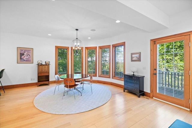 4679 Forest Ridge Dr, Holland, MI 49423 - dining area featuring light wood-style flooring, recessed lighting, and a chandelier
