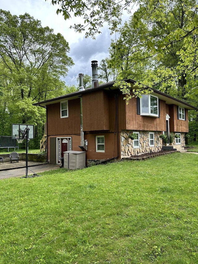 7920 8 1/2 Mile Rd, Ceresco, MI 49033 - rear view of property with a yard