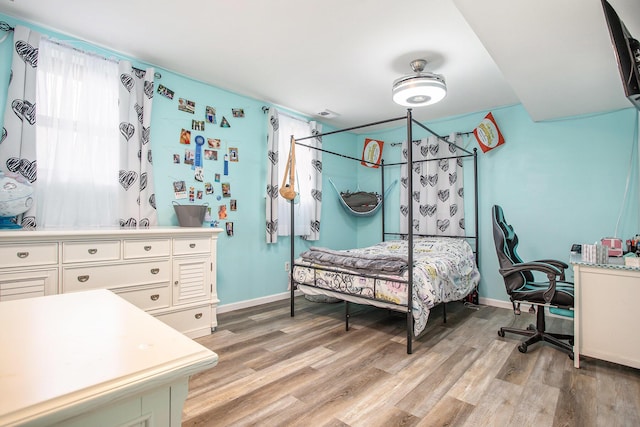 7920 8 1/2 Mile Rd, Ceresco, MI 49033 - bedroom with light wood-style floors and baseboards