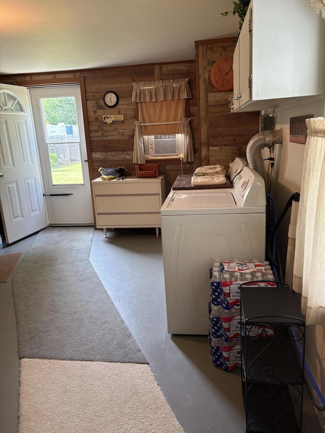 2065 Reggie Dr, Benton Harbor, MI 49022 - laundry room with cabinet space, washer and dryer, wooden walls, and cooling unit