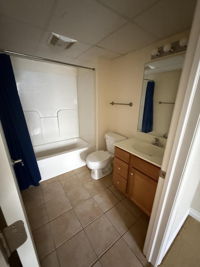 5798 Wacker Dr, Stevensville, MI 49127 - bathroom with vanity, a drop ceiling, shower / tub combo with curtain, and tile patterned floors