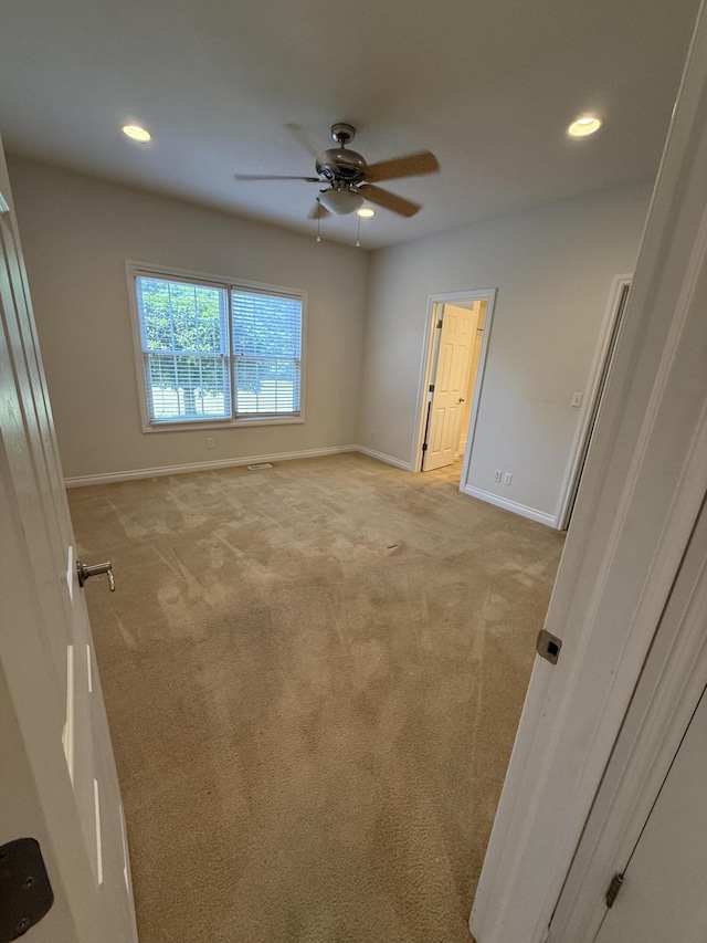 5798 Wacker Dr, Stevensville, MI 49127 - unfurnished room featuring ceiling fan, recessed lighting, and light colored carpet
