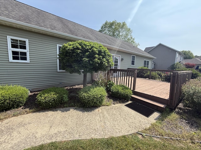 5798 Wacker Dr, Stevensville, MI 49127 - rear view of house with a deck and a shingled roof