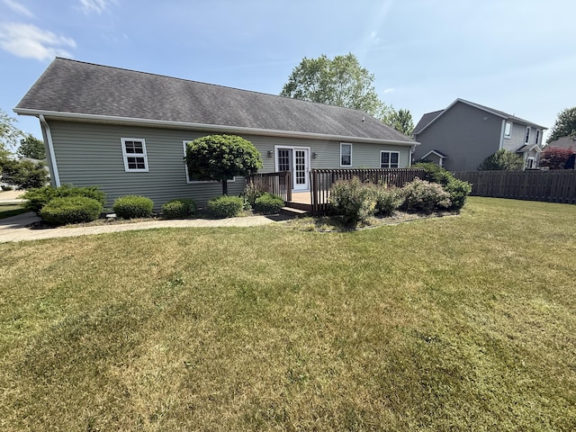 5798 Wacker Dr, Stevensville, MI 49127 - view of front of home featuring a wooden deck and a shingled roof