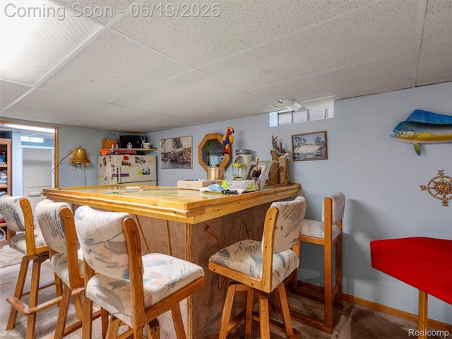 436 Orchard St, Wyandotte, MI 48192 - bar area featuring fridge, a drop ceiling, and carpet floors