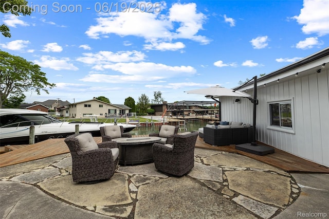 49775 Keycove St, Chesterfield, MI 48047 - view of patio with an outdoor living space with a fire pit and a residential view