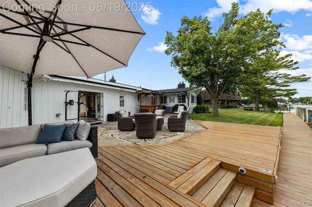 49775 Keycove St, Chesterfield, MI 48047 - deck with an outdoor living space and a lawn