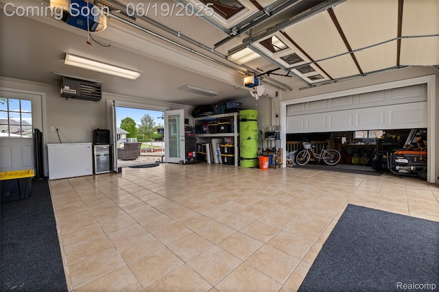 49775 Keycove St, Chesterfield, MI 48047 - garage featuring a garage door opener, fridge, and a heating unit