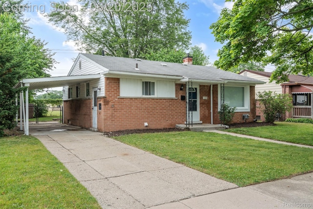 339 Shotka St, Westland, MI 48186 - view of front of house featuring brick siding, an attached carport, concrete driveway, and a chimney