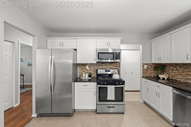 339 Shotka St, Westland, MI 48186 - kitchen featuring stainless steel appliances, white cabinetry, and tasteful backsplash