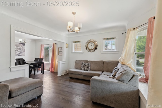 17398 Hanna St, Melvindale, MI 48122 - living room featuring a chandelier and dark wood-style floors