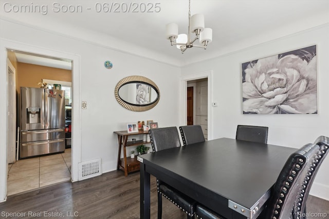 17398 Hanna St, Melvindale, MI 48122 - dining space with a chandelier and wood finished floors