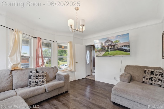 17398 Hanna St, Melvindale, MI 48122 - living area with a chandelier and dark wood-style flooring