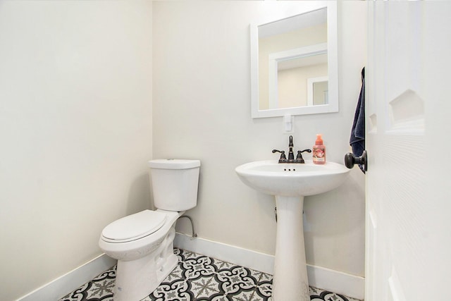 701 E Alice St, Whitehall, MI 49461 - bathroom featuring baseboards
