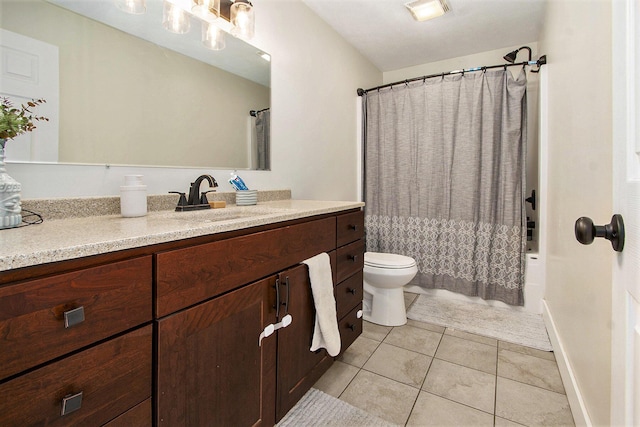 701 E Alice St, Whitehall, MI 49461 - bathroom featuring vanity, tile patterned floors, and shower / bath combo with shower curtain
