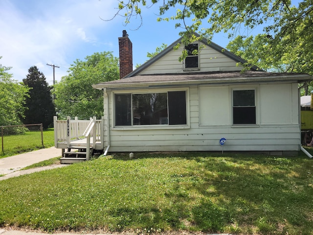 23077 Piper Ave, Eastpointe, MI 48021 - view of front of property featuring a chimney and a shingled roof