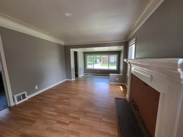 23077 Piper Ave, Eastpointe, MI 48021 - unfurnished living room with crown molding and wood finished floors