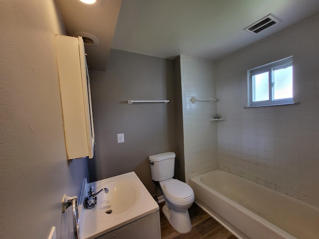 23077 Piper Ave, Eastpointe, MI 48021 - full bath with wood finished floors, vanity, and shower / bathtub combination