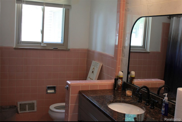 29150 Geraldine Ct, Warren, MI 48093 - bathroom with tile walls, vanity, and wainscoting