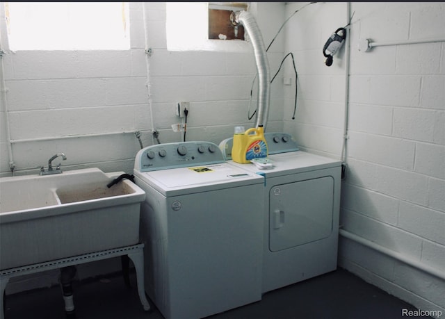 29150 Geraldine Ct, Warren, MI 48093 - washroom featuring washer and dryer and concrete block wall