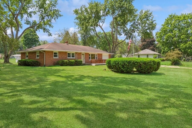 3202 Niles Buchanan Rd, Buchanan, MI 49107 - back of house featuring a yard and brick siding