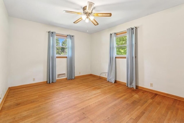 3202 Niles Buchanan Rd, Buchanan, MI 49107 - spare room featuring plenty of natural light, light wood-style flooring, and ceiling fan
