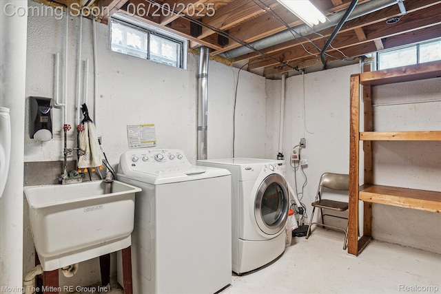 49212 Kimberly Ann Ln, Chesterfield, MI 48051 - laundry area featuring washing machine and clothes dryer and plenty of natural light