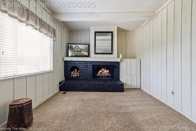 49212 Kimberly Ann Ln, Chesterfield, MI 48051 - living area featuring carpet floors, a brick fireplace, wooden walls, and beamed ceiling