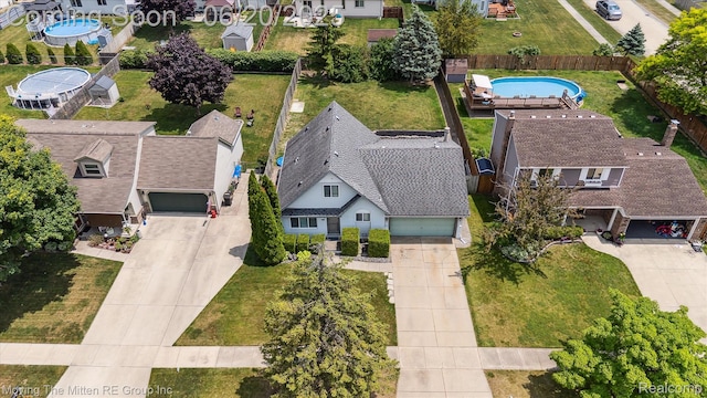 49212 Kimberly Ann Ln, Chesterfield, MI 48051 - aerial perspective of suburban area featuring a pool area
