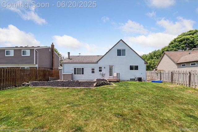 49212 Kimberly Ann Ln, Chesterfield, MI 48051 - rear view of house featuring a fenced backyard and a shingled roof