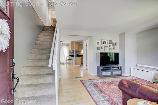 3626 Prairie Ave, Berkley, MI 48072 - foyer entrance featuring light wood finished floors and stairway