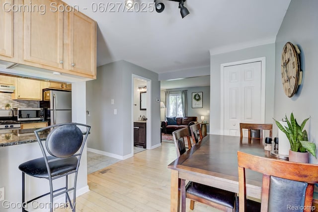 3626 Prairie Ave, Berkley, MI 48072 - dining room featuring light wood-style floors and baseboards