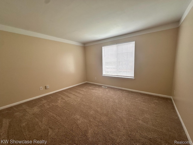490 N Fox Hills Dr N Unit 2, Bloomfield Hills, MI 48304 - empty room with carpet floors and crown molding