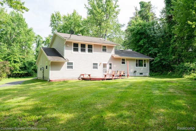 3485 Burrus Ct, Ortonville, MI 48462 - back of house featuring a yard and a deck