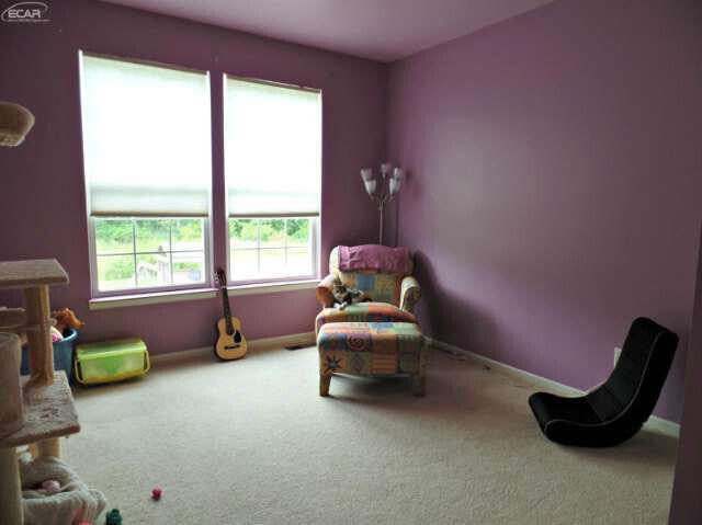 6296 Moonstone Dr, Grand Blanc, MI 48439 - living area with carpet