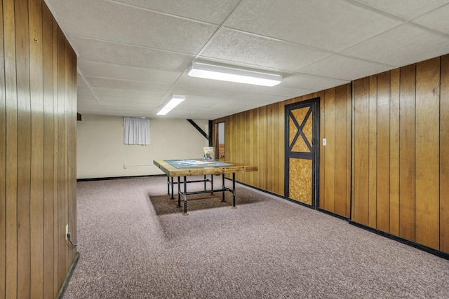 1603 Park Rd, Jackson, MI 49203 - rec room featuring a paneled ceiling, carpet floors, and wood walls