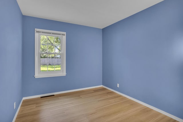 1603 Park Rd, Jackson, MI 49203 - unfurnished room with wood finished floors