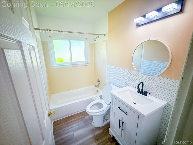 32303 Glen St, Westland, MI 48186 - bathroom featuring wood finished floors, vanity,  shower combination, and backsplash