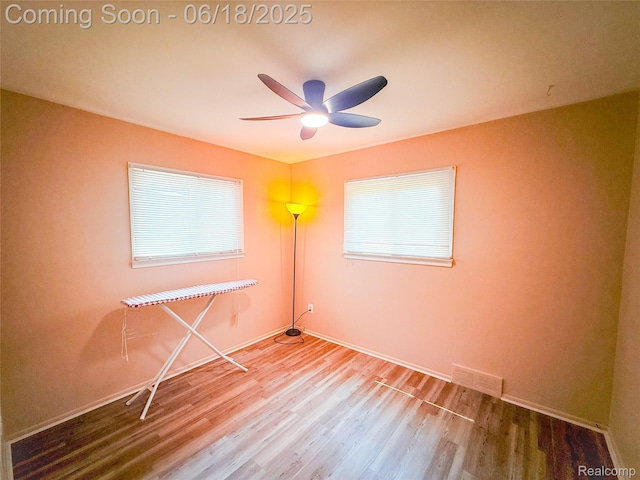 32303 Glen St, Westland, MI 48186 - empty room featuring wood finished floors, ceiling fan, and healthy amount of natural light