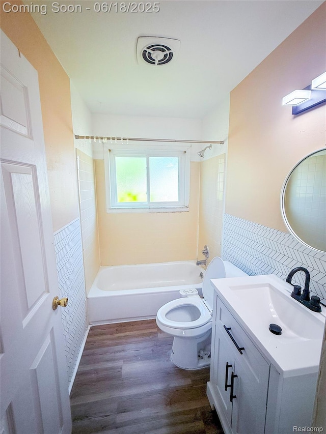 32303 Glen St, Westland, MI 48186 - full bath featuring vanity, wood finished floors, and shower / washtub combination