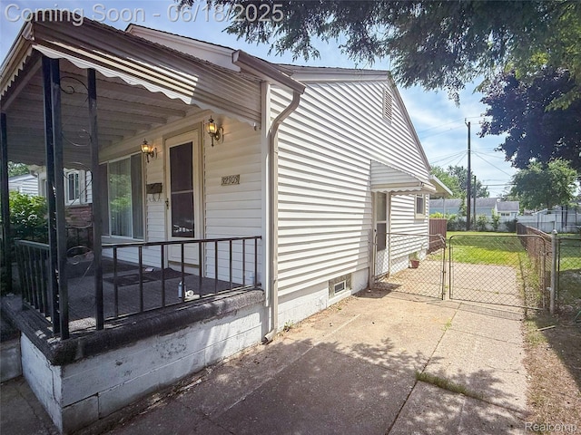 32303 Glen St, Westland, MI 48186 - view of property exterior featuring a gate and a porch