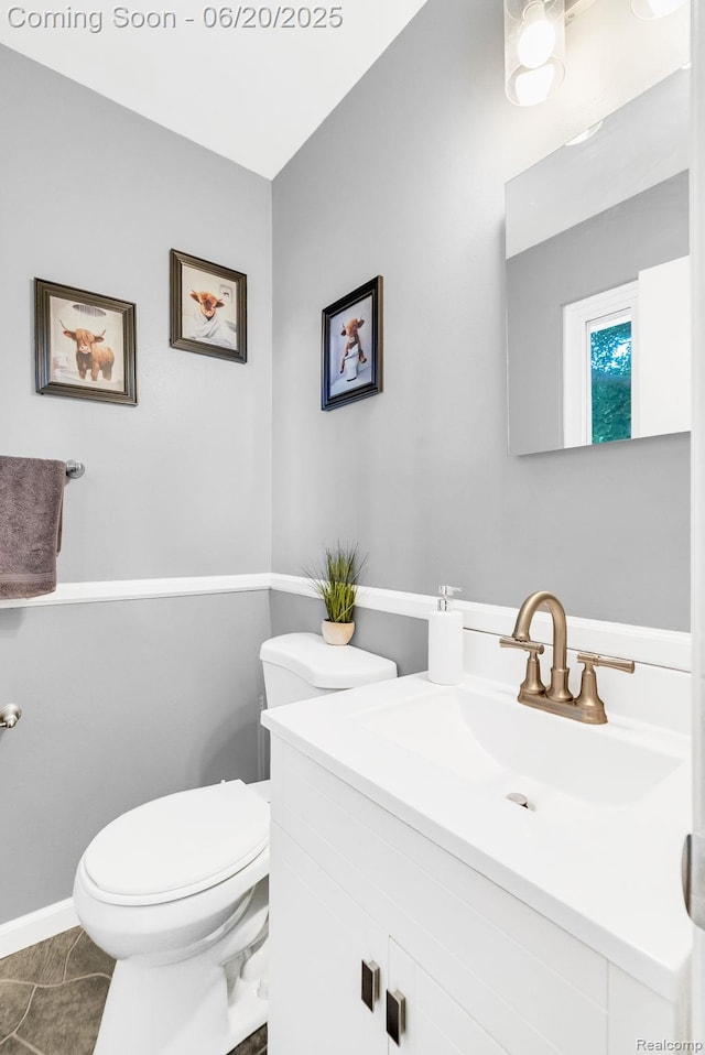 312 Airport Dr, Holly, MI 48442 - half bath featuring vanity and toilet