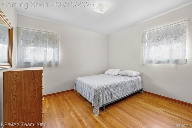 6514 Maple St, Dearborn, MI 48126 - bedroom with wood finished floors and baseboards