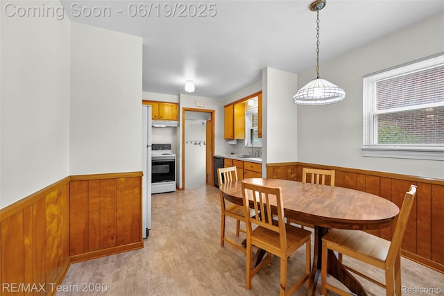 6514 Maple St, Dearborn, MI 48126 - dining area with wainscoting and wood walls